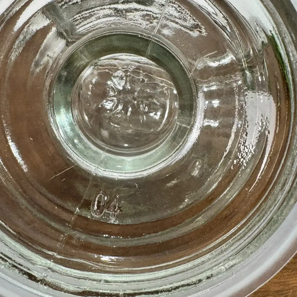 Clear Glass Apothecary Storage Jar with Lid Star Design on Lid 5